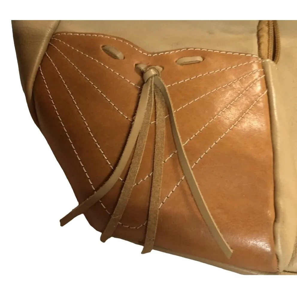 Marco Buggiani caramel and tan brown colored leather, two strap,  XL drawstring top, multi-pocket, messenger bag/backpack