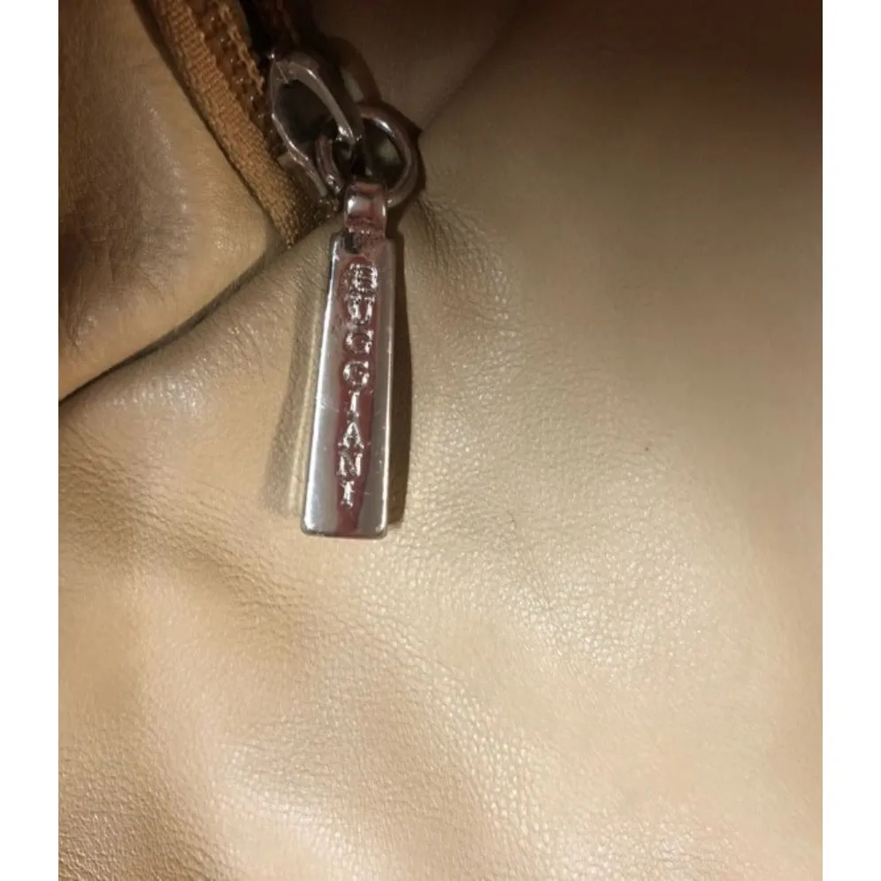 Marco Buggiani caramel and tan brown colored leather, two strap,  XL drawstring top, multi-pocket, messenger bag/backpack